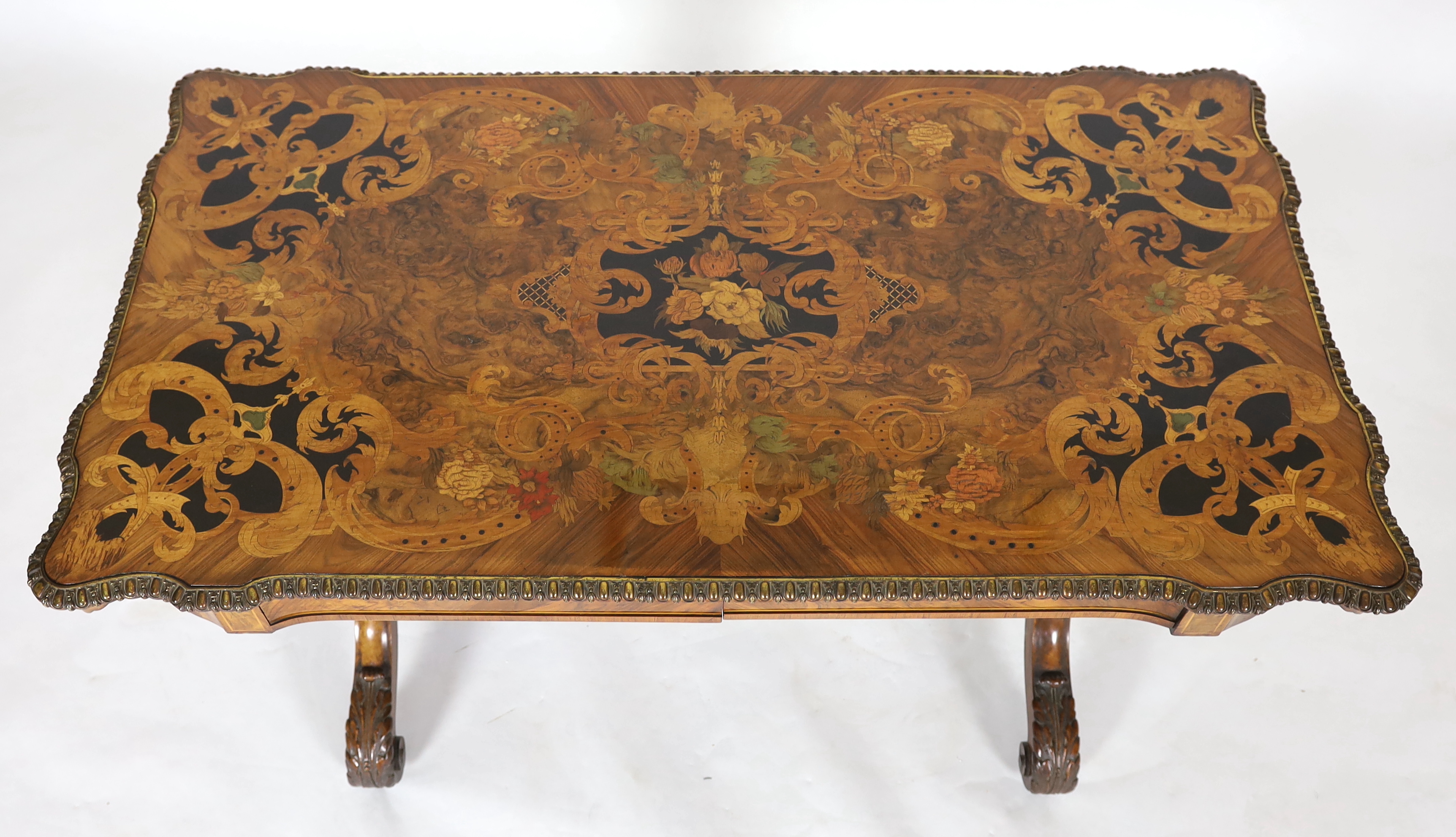 A good Victorian ormolu mounted walnut and marquetry centre table, 129cm wide, 70cm deep, 73cm high